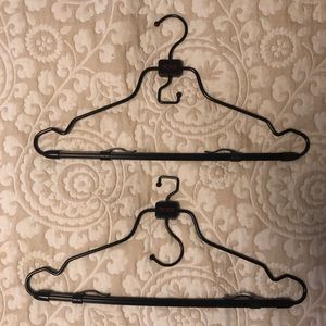 2 Tumi travel hangers